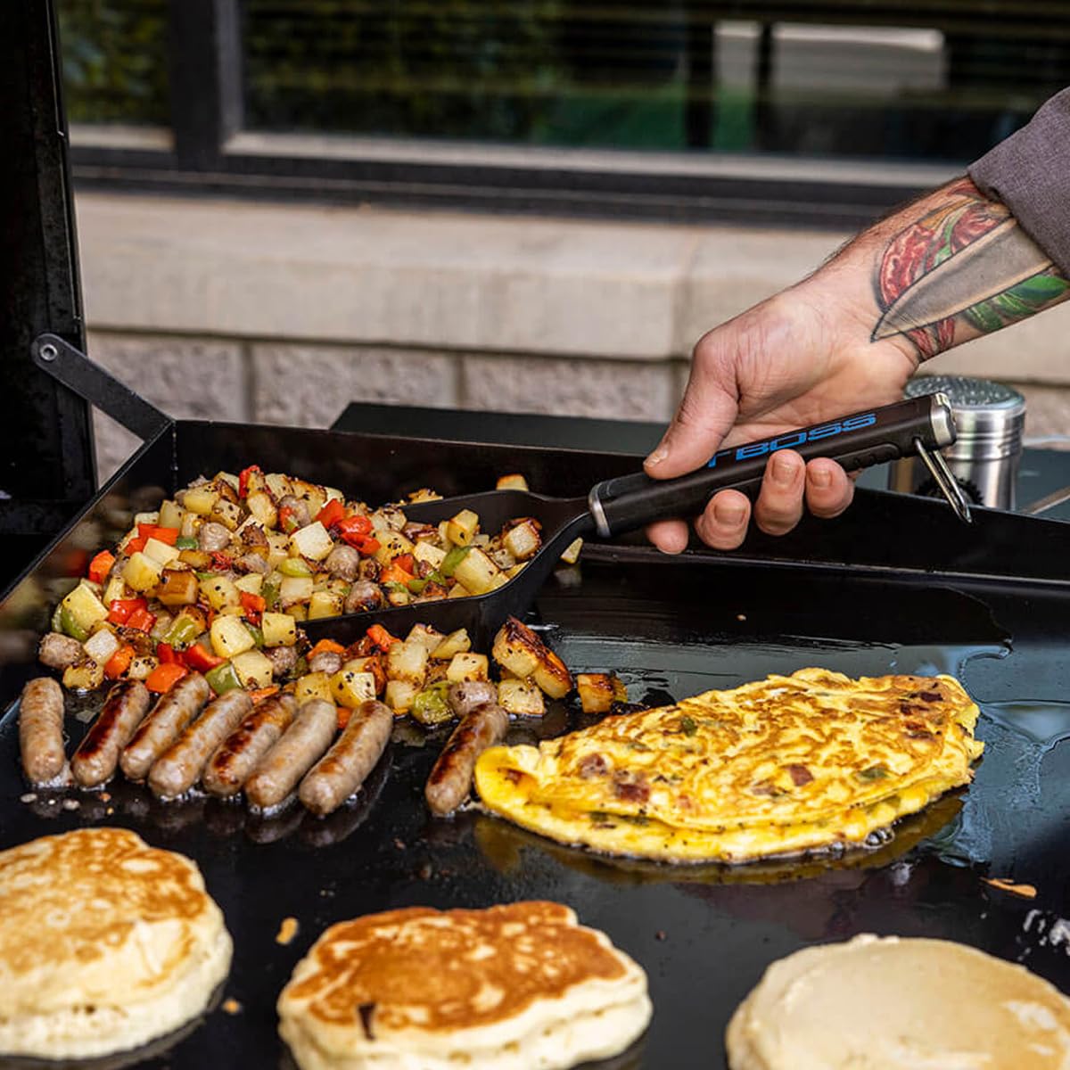 Pit Boss Ultimate Griddle Grub Shovel serves from grill to table with less mess.