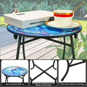 Plant Castle 14-inch round patio table, ideal for outdoor drinks on a sunny balcony.