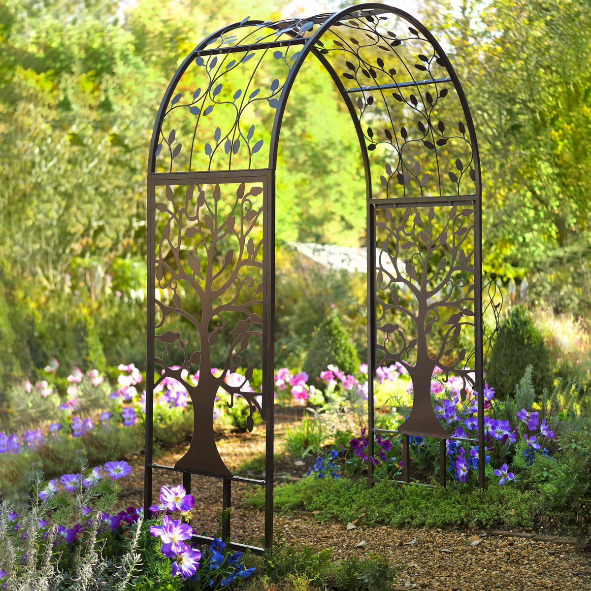 Plow & Hearth black steel trellis arbor marking an inviting garden entry
