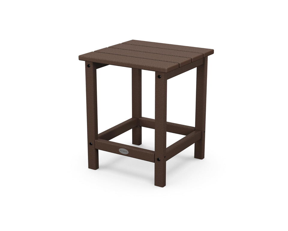 POLYWOOD Long Island 18-inch side table in mahogany beside outdoor chairs.