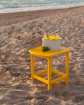South Beach side table outdoor scene emphasizes compact footprint for drinks and snacks.