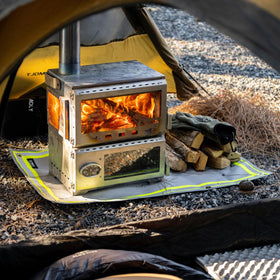POMOLY Fire Pit Mat shown under grill setup protecting the deck from heat.