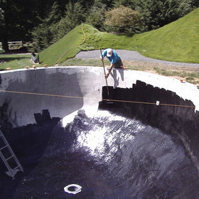 Pond Shield on concrete surface shows strong adhesion and seamless waterproofing.