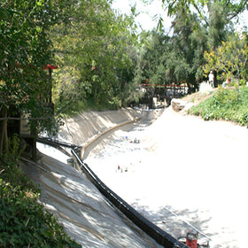 Pond Shield tan epoxy coating easy to maintain with algae wipe-down.