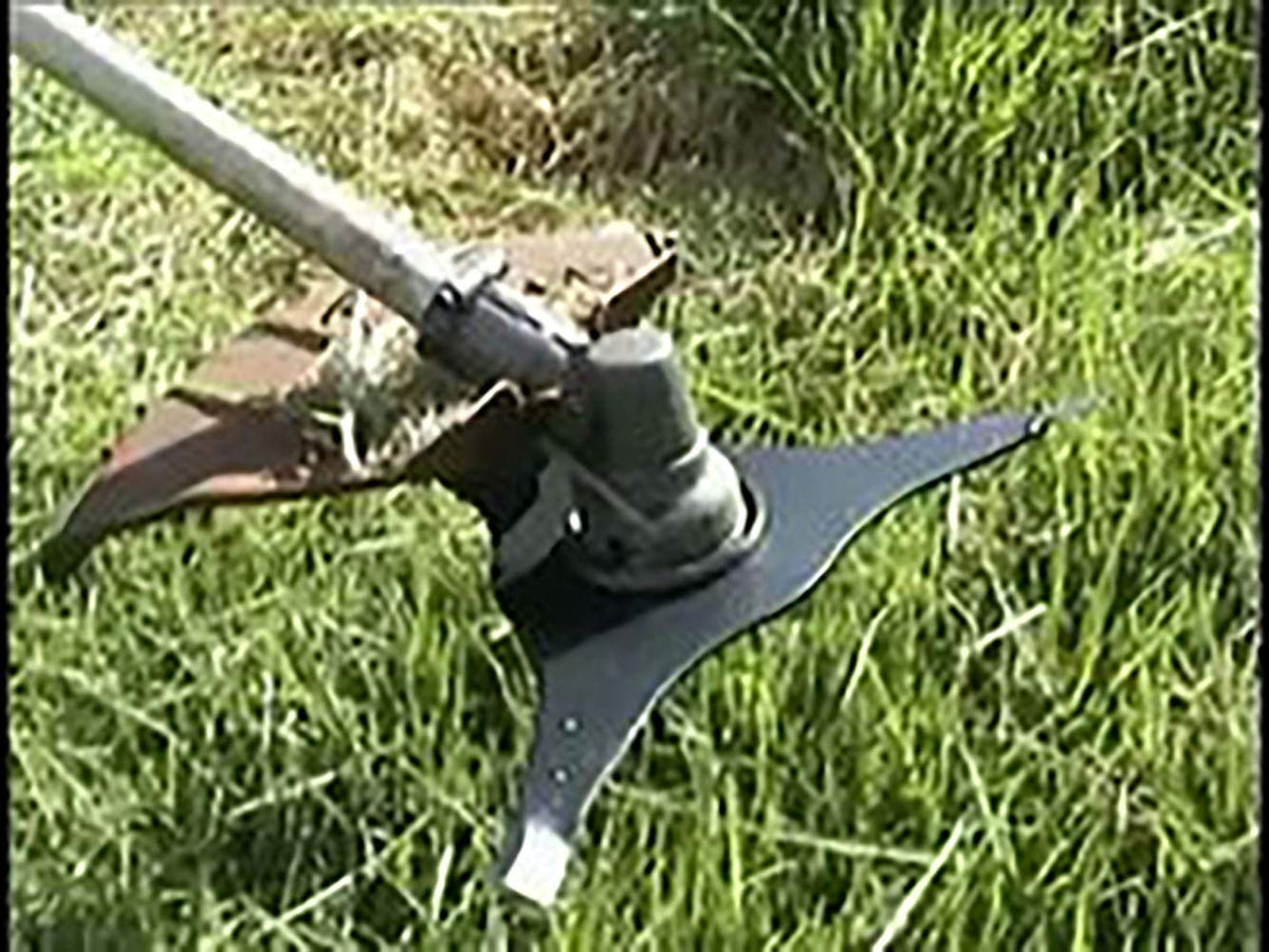 Pool Supply Town steel blade in action tackling undergrowth and heavy weeds with confidence
