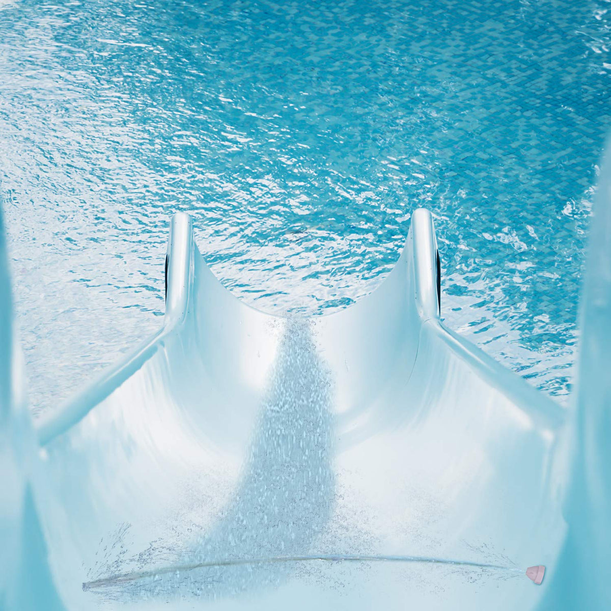 Poolmaster spray nozzles show adjustable spray points for uniform wetness.