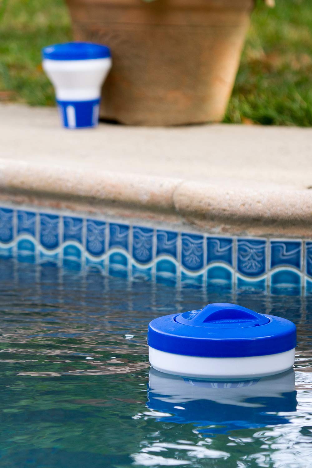 Poolmaster twist-lock cap enables quick, spill-free chlorine tablet refills.