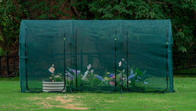 Porayhut tunnel netting cover protects a 12-3x4ft bed from pests while allowing rainwater.