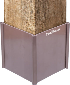 Post Shields 4x4 post protector cover on a wooden post guarding against lawn mower damage