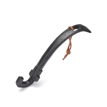 ppztkk Cast Iron Grill Lifter handle gripping a hot grate safely