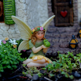 PRETMANNS Colorful fairy supplies brighten small garden setups.