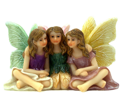 PRETMANNS fairies sitting sisters—whimsical outdoor garden decor for charming displays.