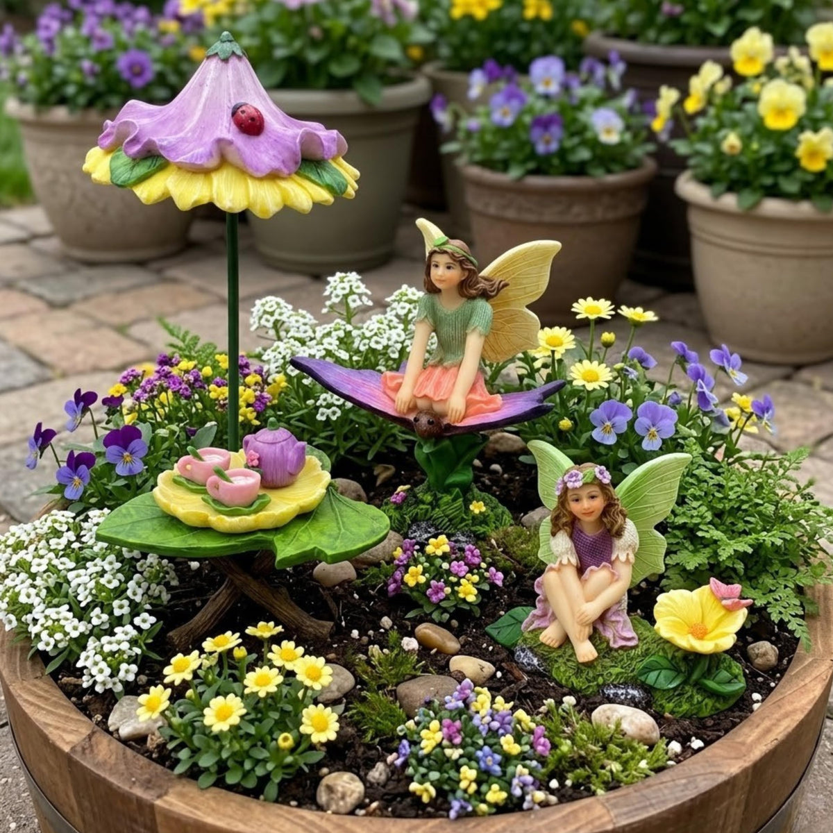 PRETMANNS fairy garden furniture set adds charming storytelling surfaces.