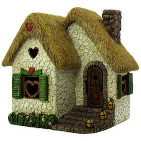 Pretmanns seven-inch outdoor fairy house with opening door enhances garden whimsy