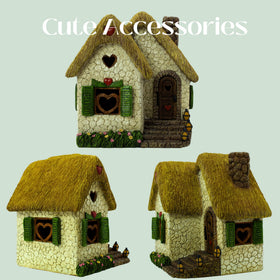 Pretmanns fairy house red-tile-roof adds colorful focal point to village displays