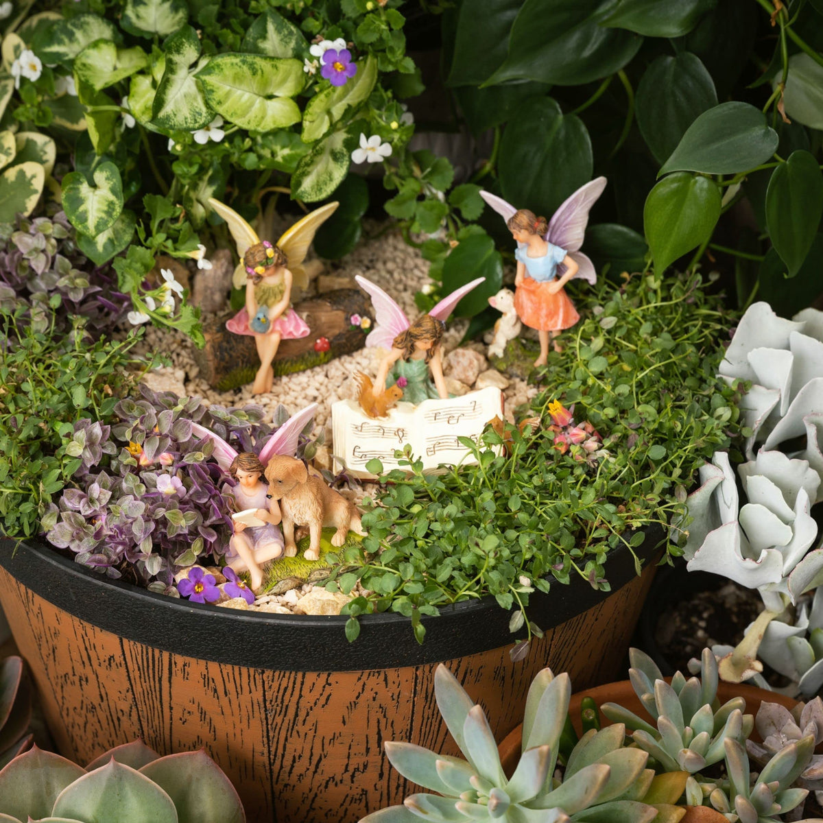 PRETMANNS resin fairy garden accessory withstands weather for year-round displays.