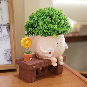 Pricetail Smiley Face Planter with tiny envelope detail adds playful decor