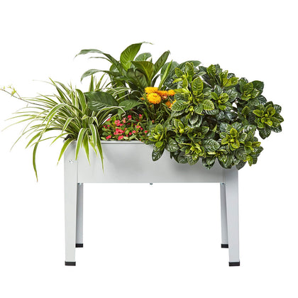 ProGard raised garden bed with legs on a grey balcony for easy herb cultivation.