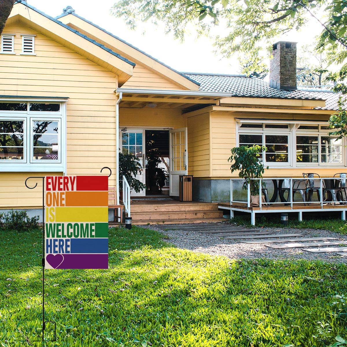 Pudodo Rainbow Welcome flag detail shows durable linen texture for outdoor use.