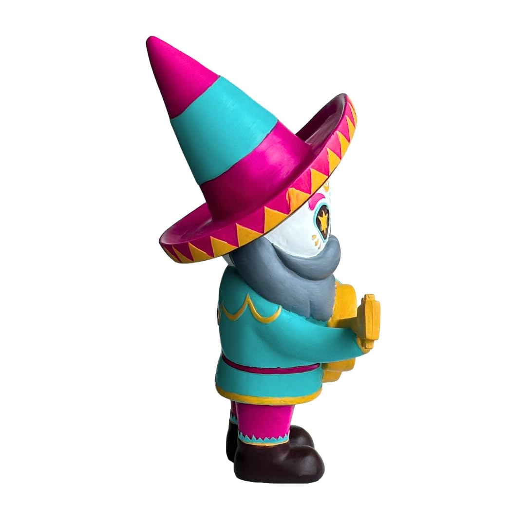 Pueblita El Mariachi gnome in a garden scene among plants.