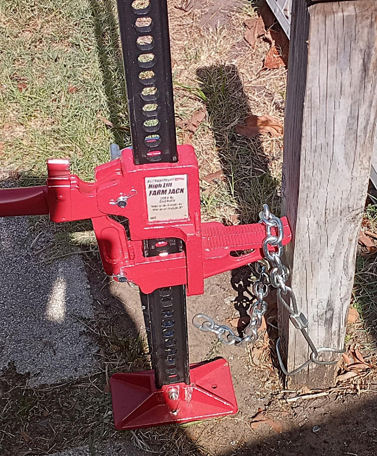 Pull A Post in action extracting a wooden fence post quickly