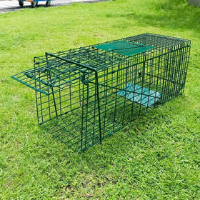 PULOMI collapsible trap side profile in green, highlighting compact storage and portability