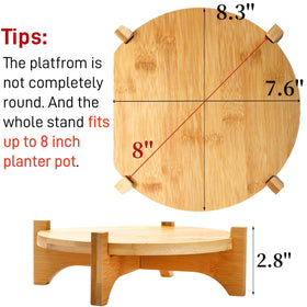 Pumtus bamboo plant stand assembly step shows easy setup.