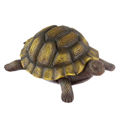 Pure Garden Turtle Statue resting on the ground enhances garden decor with serene charm.