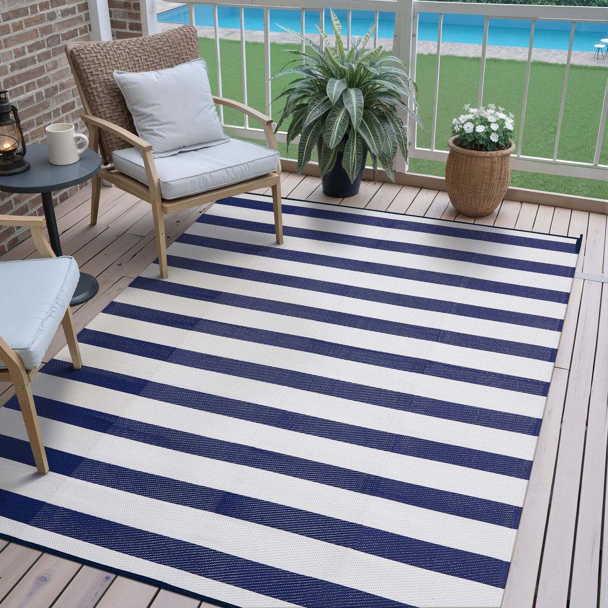 PureCozy outdoor rug with navy blue stripes for patios and decks.