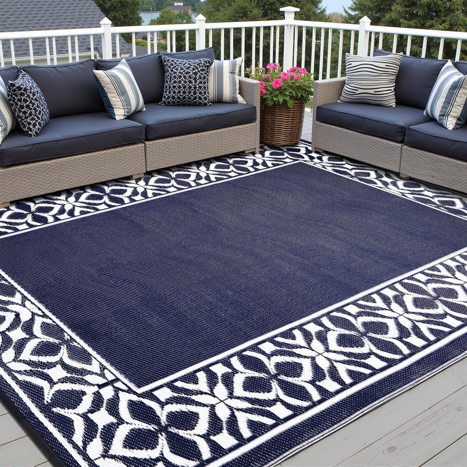 PureCozy navy geometric outdoor rug on a patio, easy to clean