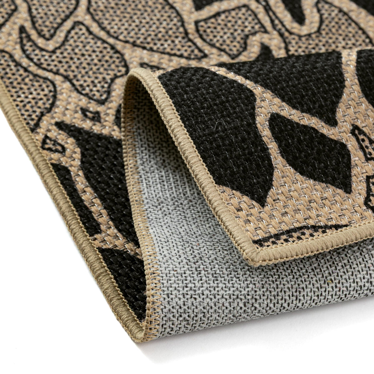 PureCozy outdoor rug wet surface close-up showing quick-drying benefits