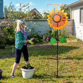 Pure Echo wind spinner with sturdy three-foot base offers stable yard presence.