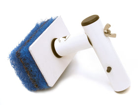 Purity Pool TSQC tile scrubber angled reach under edge for thorough tile cleaning