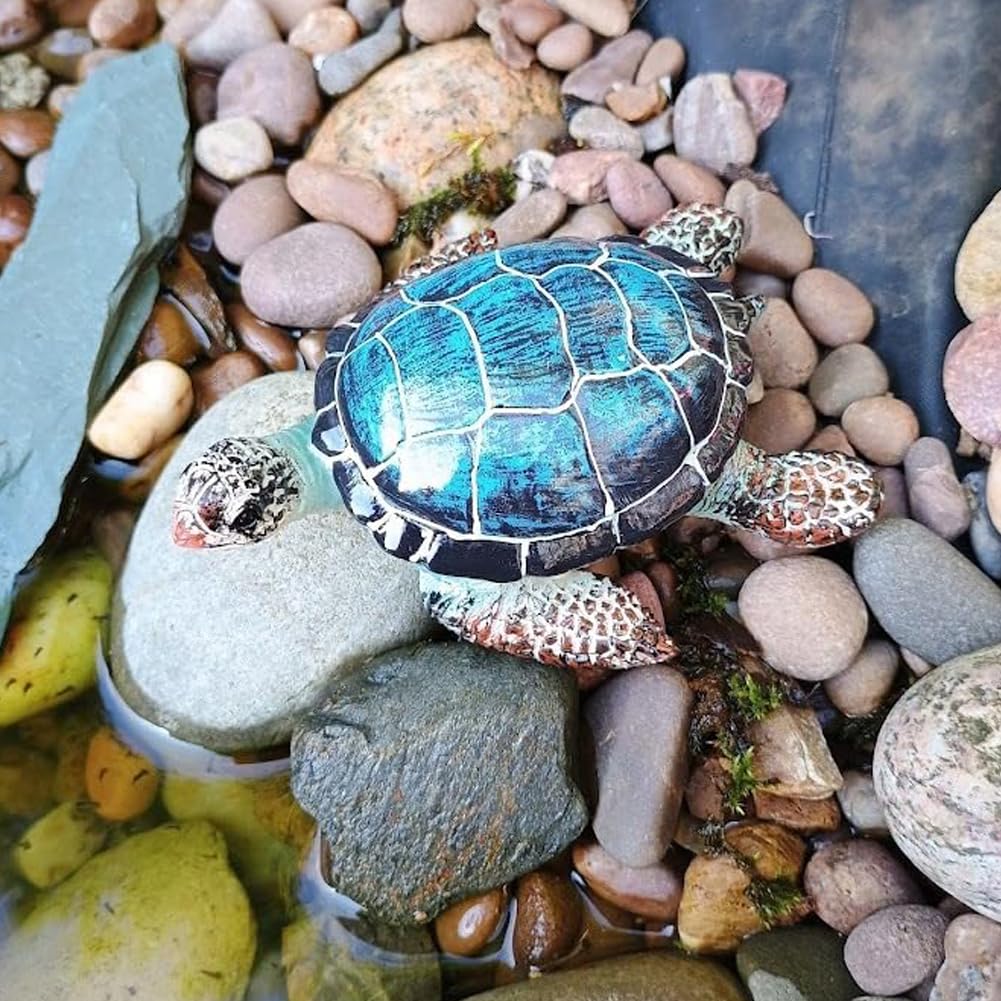 Purple Star blue turtle sculpture creates a charming focal point in coastal-themed gardens.