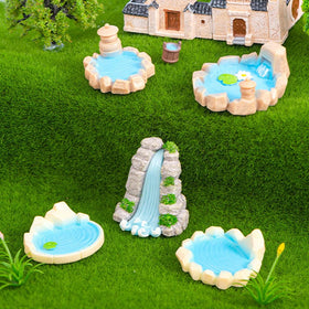 Purple Star ponds pair well with small figurines for creative garden decor.