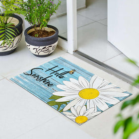 Putware butterfly accent mat showcases daisies with non-slip backing for safe doorstep.