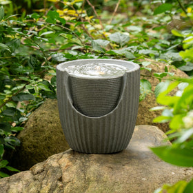 Puulye outdoor fountain LED illumination highlights evening ambience.