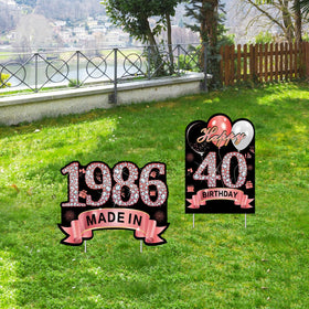 Puyruiv 1986 motif yard sign features sparkling numbers.
