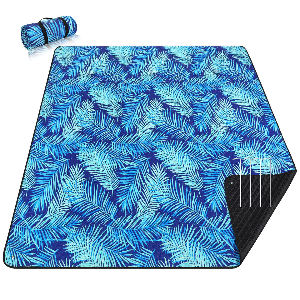 PY SUPER MODE picnic blanket with blue leaves pattern, open for family outdoor dining and lounging.