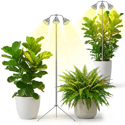 QCQHDU full-spectrum grow light mounted on an adjustable tripod for seedling growth indoors.