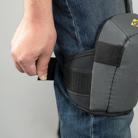 Adjustable hook-and-loop strap keeps QEP knee pads securely in place.