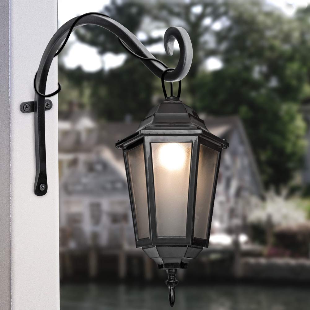 Qiang Ni black plant hooks complement outdoor decor.