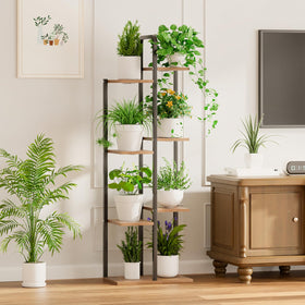 Qiaogreen metal stand with black finish adds durable, stylish decor to any room.