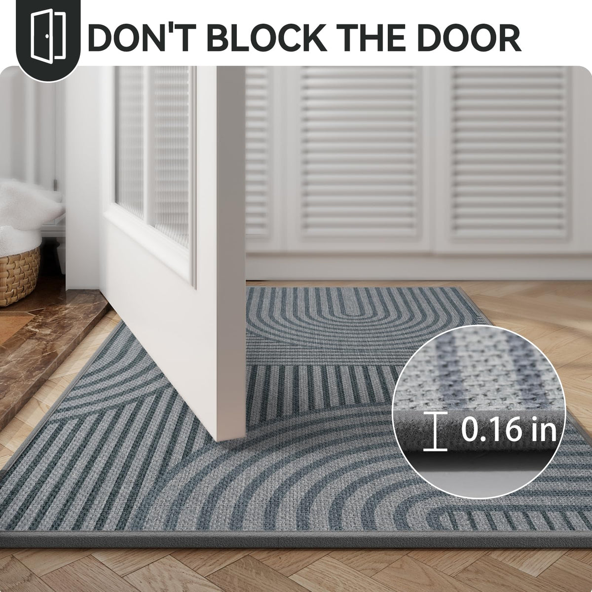 QiCaiJia low-profile indoor-outdoor mat lies flat behind doors.