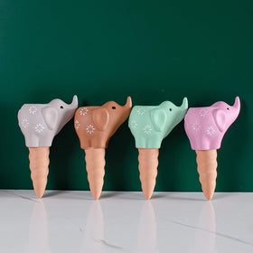 QinSuiKai elephant-shaped terracotta spike delivers steady water to indoor plants.