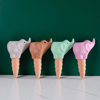 QinSuiKai elephant-shaped terracotta spike delivers steady water to indoor plants.