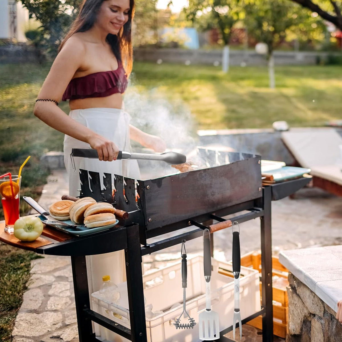 Qinshaine tongs-in-use-grilling shows flipping without dropping food.