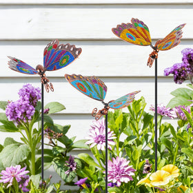 Qipade butterfly stake height adds vertical interest to porch display.