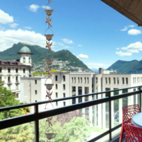 Bell pendant at the bottom adds a crisp chime with rain