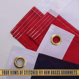 QLASH flag with brass grommets and reinforced header for secure mounting.